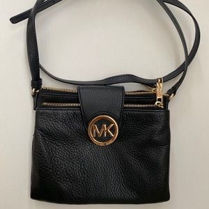 Black leather Michael Kors purse